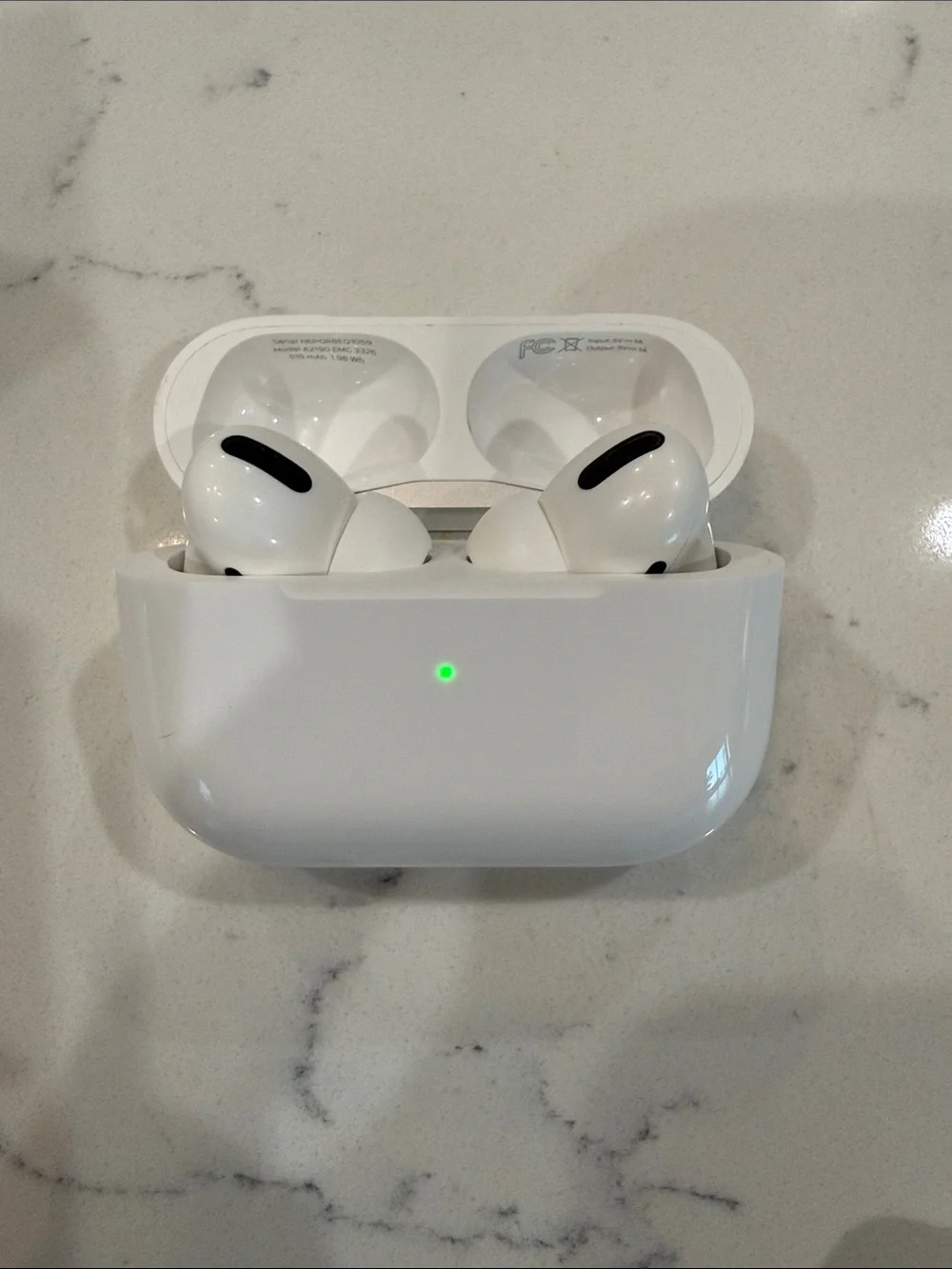 Apple AirPods Pro with MagSafe Charging Case + Kate Spade Black Silicone Case